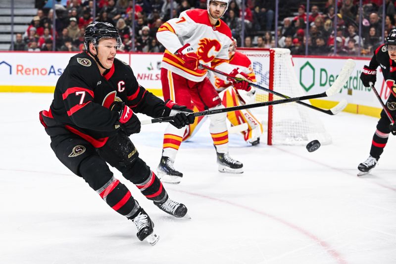 Nov 25, 2024; Ottawa, Ontario, CAN; Ottawa Senators left wing Brady Tkachuk (7) tracks the puck in the air against the Calgary Flames during the first period at Canadian Tire Centre. Mandatory Credit: David Kirouac-Imagn Images