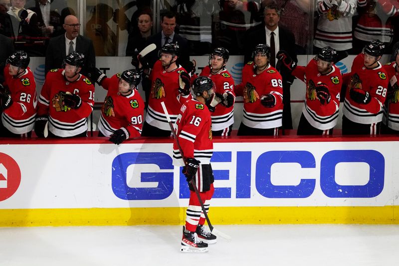 Apr 13, 2023; Chicago, Illinois, USA; Chicago Blackhawks left wing Jujhar Khaira (16) celebrates his goal against the Philadelphia Flyers during the first period at United Center. Mandatory Credit: David Banks-USA TODAY Sports