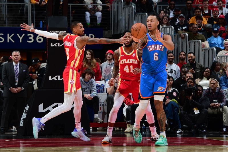 ATLANTA, GA - JANUARY 3: Jaylin Williams #6 of the Oklahoma City Thunder passes the ball during the game against the Atlanta Hawks on January 3, 2024 at State Farm Arena in Atlanta, Georgia.  NOTE TO USER: User expressly acknowledges and agrees that, by downloading and/or using this Photograph, user is consenting to the terms and conditions of the Getty Images License Agreement. Mandatory Copyright Notice: Copyright 2024 NBAE (Photo by Scott Cunningham/NBAE via Getty Images)