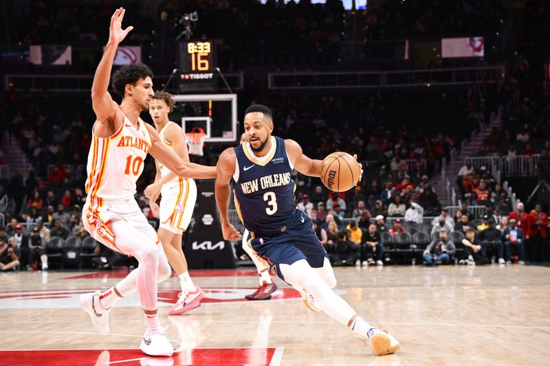 ATLANTA, GA - DECEMBER 2:  CJ McCollum #3 of the New Orleans Pelicans handles the ball during the game against the Atlanta Hawks on December 2, 2024 at State Farm Arena in Atlanta, Georgia.  NOTE TO USER: User expressly acknowledges and agrees that, by downloading and/or using this Photograph, user is consenting to the terms and conditions of the Getty Images License Agreement. Mandatory Copyright Notice: Copyright 2024 NBAE (Photo by Adam Hagy/NBAE via Getty Images)