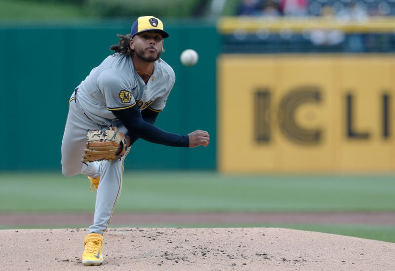 Apr 25, 2024; Pittsburgh, Pennsylvania, USA;  Milwaukee Brewers starting pitcher Freddy Peralta (51) delivers a pitch against the Pittsburgh Pirates during the first inning at PNC Park. Mandatory Credit: Charles LeClaire-USA TODAY Sports