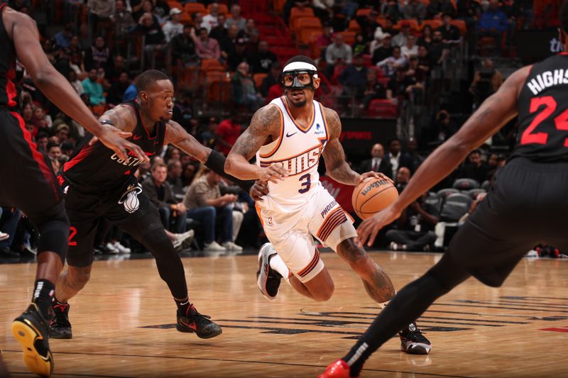 MIAMI, FL - JANUARY 29: Bradley Beal #3 of the Phoenix Suns handles the ball during the game against the Miami Heat on January 29, 2024 at Kaseya Center in Miami, Florida. NOTE TO USER: User expressly acknowledges and agrees that, by downloading and or using this Photograph, user is consenting to the terms and conditions of the Getty Images License Agreement. Mandatory Copyright Notice: Copyright 2024 NBAE (Photo by Issac Baldizon/NBAE via Getty Images)