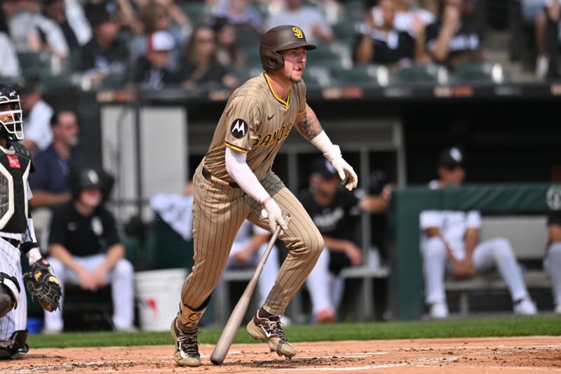 Sep 21, 2025; Chicago, Illinois, USA; San Diego Padres outfielder Jackson Merrill (3) hits a single against the Chicago White Sox during the second inning at Rate Field. Mandatory Credit: Patrick Gorski-Imagn Images