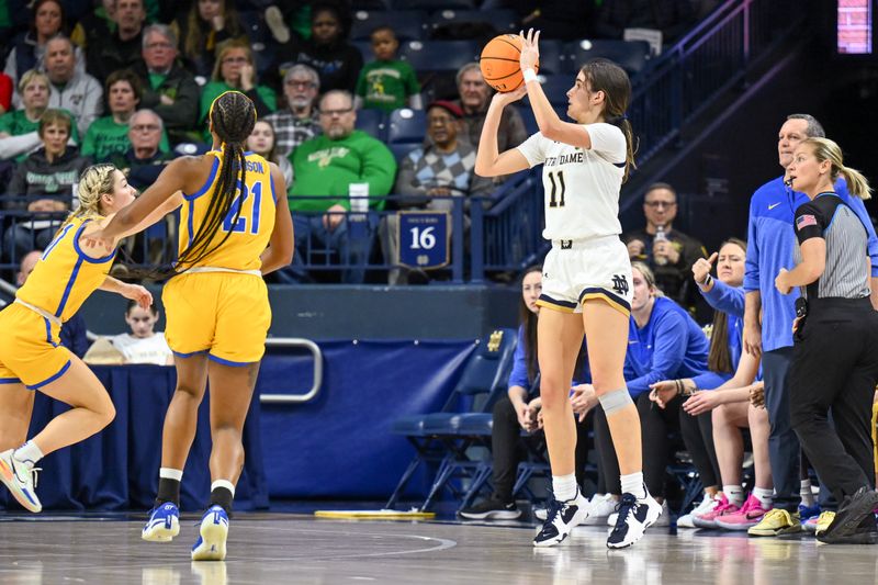 Feb 9, 2023; South Bend, Indiana, USA; Notre Dame Fighting Irish guard Sonia Citron (11) shoots a three point basket in the first half against the Pittsburgh Panthers at the Purcell Pavilion. Mandatory Credit: Matt Cashore-USA TODAY Sports