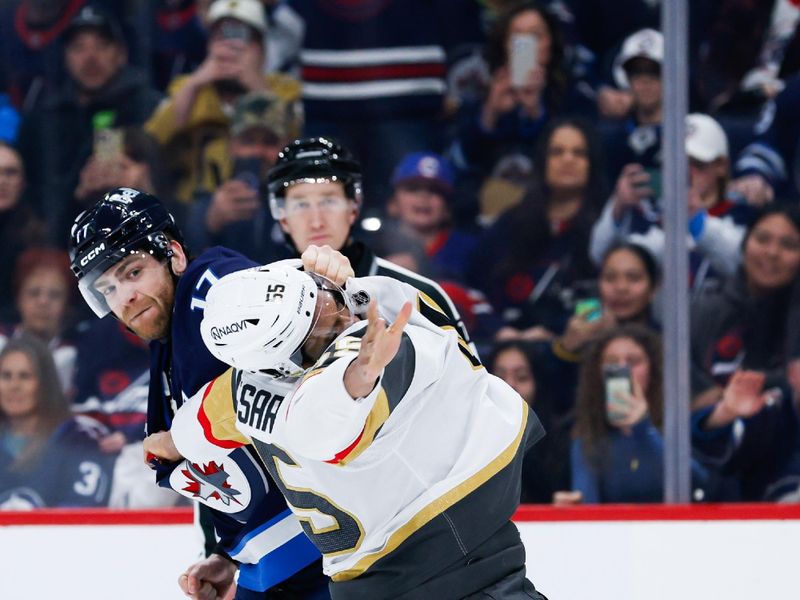 Jan 6, 2026; Winnipeg, Manitoba, CAN;  Winnipeg Jets forward Adam Lowry (17) fights Vegas Golden Knights forward Keegan Kolesar (55) during the first period at Canada Life Centre. Mandatory Credit: Terrence Lee-Imagn Images