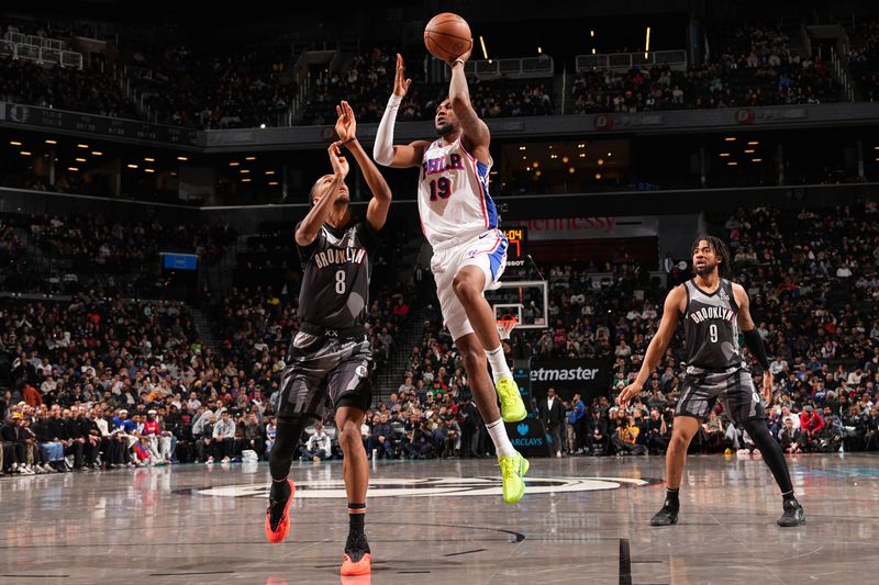 BROOKLYN, NY - FEBRUARY 12: Justin Edwards #19 of the Philadelphia 76ers drives to the basket during the game against the Brooklyn Nets on February 12, 2025 at Barclays Center in Brooklyn, New York. NOTE TO USER: User expressly acknowledges and agrees that, by downloading and or using this Photograph, user is consenting to the terms and conditions of the Getty Images License Agreement. Mandatory Copyright Notice: Copyright 2025 NBAE (Photo by Jesse D. Garrabrant/NBAE via Getty Images)