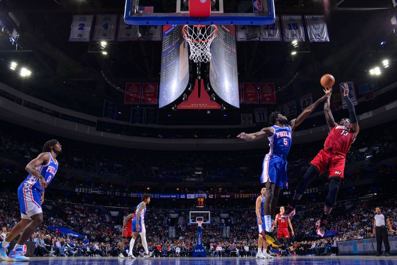 PHILADELPHIA, PA - MARCH 18: Bam Adebayo #13 of the Miami Heat shoots the ball during the game against the Philadelphia 76ers on March 18, 2024 at the Wells Fargo Center in Philadelphia, Pennsylvania NOTE TO USER: User expressly acknowledges and agrees that, by downloading and/or using this Photograph, user is consenting to the terms and conditions of the Getty Images License Agreement. Mandatory Copyright Notice: Copyright 2024 NBAE (Photo by Jesse D. Garrabrant/NBAE via Getty Images)