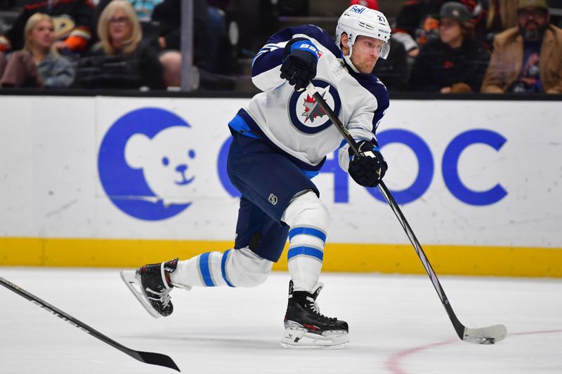 Jan 5, 2024; Anaheim, California, USA; Winnipeg Jets left wing Nikolaj Ehlers (27) moves in for a shot against the Anaheim Ducks during the first period at Honda Center. Mandatory Credit: Gary A. Vasquez-USA TODAY Sports