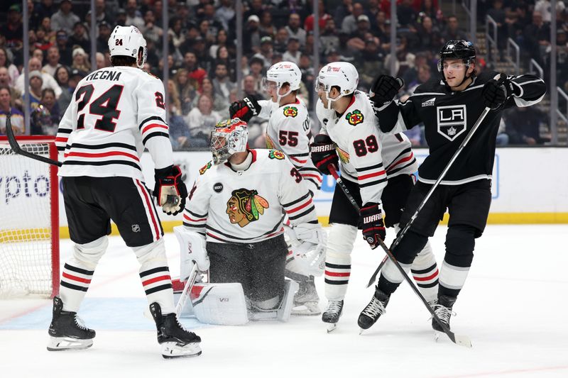 Mar 19, 2024; Los Angeles, California, USA;  Los Angeles Kings right wing Alex Laferriere (78) reacts after scoring a goal against Chicago Blackhawks goaltender Petr Mrazek (34) during the first period at Crypto.com Arena. Mandatory Credit: Kiyoshi Mio-USA TODAY Sports