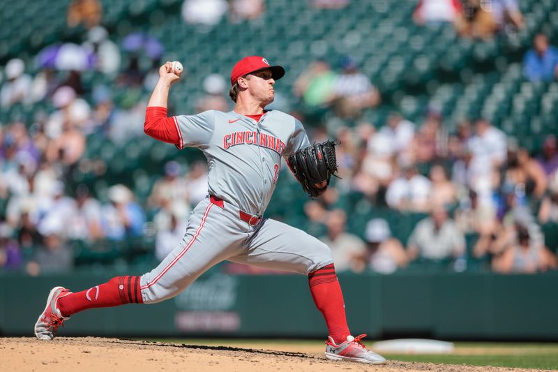 Jun 5, 2024; Denver, Colorado, USA; Cincinnati Reds relief pitcher Lucas Sims (39) delivers a pitch during the seventh inning against the Colorado Rockies at Coors Field. Mandatory Credit: Andrew Wevers-USA TODAY Sports