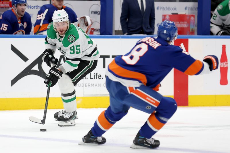 Jan 21, 2024; Elmont, New York, USA; Dallas Stars center Matt Duchene (95) skates with the puck against New York Islanders defenseman Noah Dobson (8) during the third period at UBS Arena. Mandatory Credit: Brad Penner-USA TODAY Sports