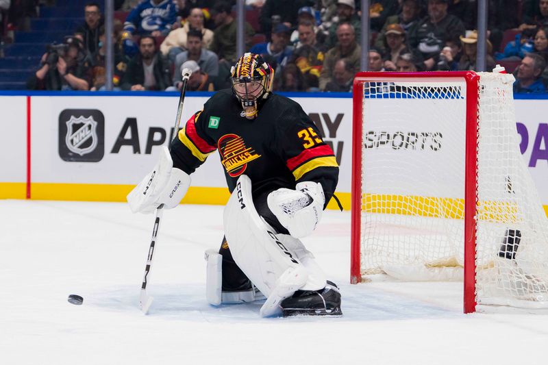 Feb 29, 2024; Vancouver, British Columbia, CAN; Vancouver Canucks goalie Thatcher Demko (35) watches the rebound against the Los Angeles Kings in the second period at Rogers Arena. Mandatory Credit: Bob Frid-USA TODAY Sports