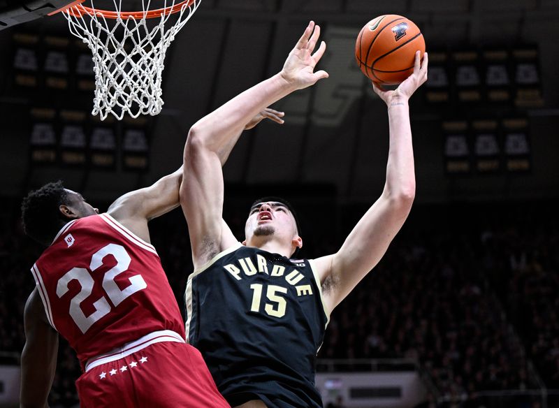 Feb 25, 2023; West Lafayette, Indiana, USA; Purdue Boilermakers center Zach Edey (15) shoots the ball over Indiana Hoosiers forward Jordan Geronimo (22) during the second half at Mackey Arena. Indiana won 79-71. Mandatory Credit: Marc Lebryk-USA TODAY Sports