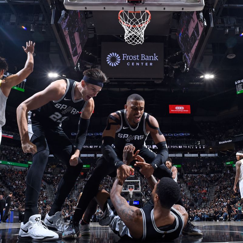 SAN ANTONIO, TX - NOVEMBER 9: Keldon Johnson #0, Zach Collins #23, and Blake Wesley #14 of the San Antonio Spurs celebrate during the game against the Utah Jazz on November 9, 2024 at the Frost Bank Center in San Antonio, Texas. NOTE TO USER: User expressly acknowledges and agrees that, by downloading and or using this photograph, user is consenting to the terms and conditions of the Getty Images License Agreement. Mandatory Copyright Notice: Copyright 2024 NBAE (Photos by Logan Riely/NBAE via Getty Images)