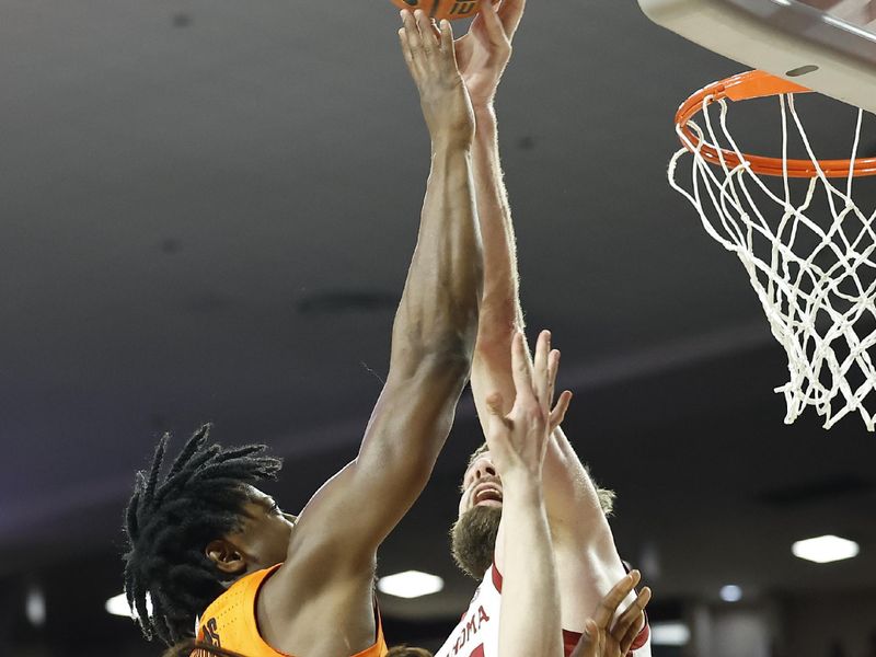 Feb 1, 2023; Norman, Oklahoma, USA; Oklahoma Sooners forward Tanner Groves (35) blocks a shot by Oklahoma State Cowboys guard Quion Williams (13) during the first half at Lloyd Noble Center. Mandatory Credit: Alonzo Adams-USA TODAY Sports