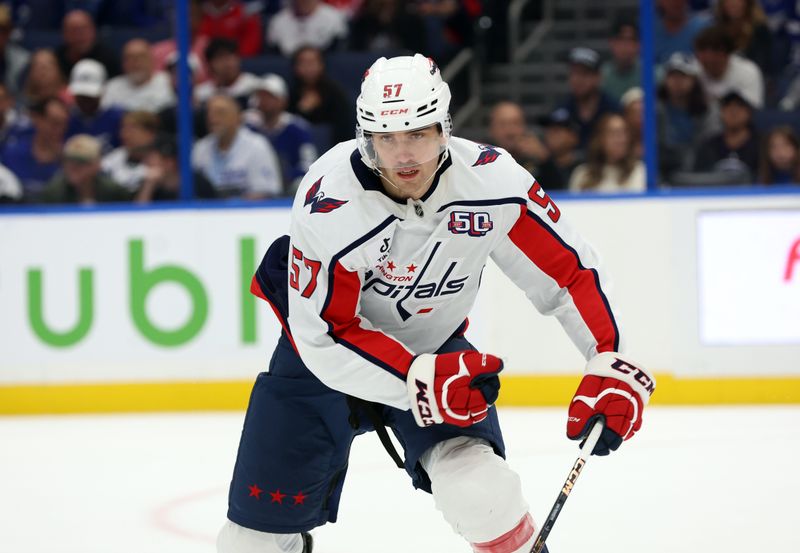 Oct 26, 2024; Tampa, Florida, USA; Washington Capitals defenseman Trevor van Riemsdyk (57) skates against the Tampa Bay Lightning during the first period at Amalie Arena. Mandatory Credit: Kim Klement Neitzel-Imagn Images