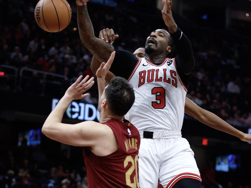 CLEVELAND, OH - FEBRUARY 14: Andre Drummond #3 of the Chicago Bulls rebounds against Georges Niang #20 of the Cleveland Cavaliers during the second half at Rocket Mortgage Fieldhouse on February 14, 2024 in Cleveland, Ohio. NOTE TO USER: User expressly acknowledges and agrees that, by downloading and or using this photograph, User is consenting to the terms and conditions of the Getty Images License Agreement. (Photo by Ron Schwane/Getty Images)