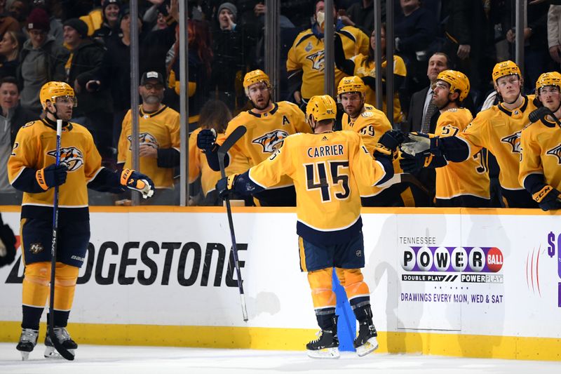 Jan 9, 2024; Nashville, Tennessee, USA; Nashville Predators defenseman Alexandre Carrier (45) celebrates with teammates after a goal during the third period against the Anaheim Ducks at Bridgestone Arena. Mandatory Credit: Christopher Hanewinckel-USA TODAY Sports