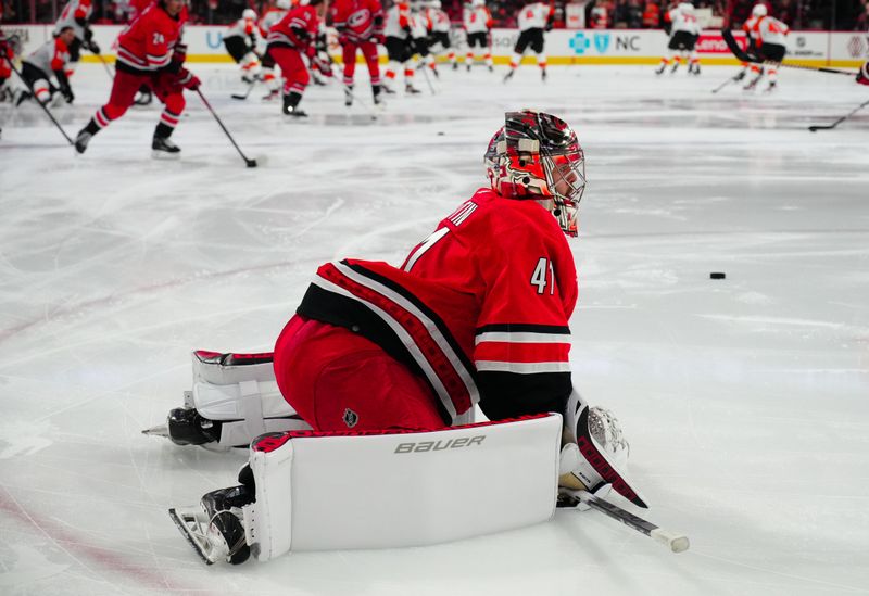 Mar 21, 2024; Raleigh, North Carolina, USA; Carolina Hurricanes goaltender Spencer Martin (41) looks on during the warmups before the game before the game against the Philadelphia Flyers at PNC Arena. Mandatory Credit: James Guillory-USA TODAY Sports