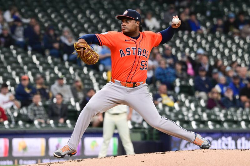 May 7, 2025; Milwaukee, Wisconsin, USA; Houston Astros starting pitcher Framber Valdez (59) throws a pitch in the first inning against the Milwaukee Brewers at American Family Field. Mandatory Credit: Benny Sieu-Imagn Images