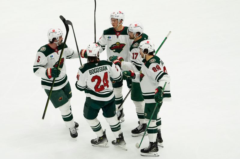 Jan 26, 2025; Chicago, Illinois, USA; Minnesota Wild left wing Marcus Foligno (17) celebrates his goal against the Chicago Blackhawks during the third period at United Center. Mandatory Credit: David Banks-Imagn Images