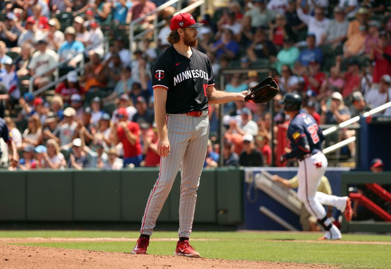 Mar 25, 2024; North Port, Florida, USA;  Minnesota Twins starting pitcher Bailey Ober (17) looks on after he gave up a home run to Atlanta Braves third baseman Austin Riley (27) during the third inning  at CoolToday Park. Mandatory Credit: Kim Klement Neitzel-USA TODAY Sports