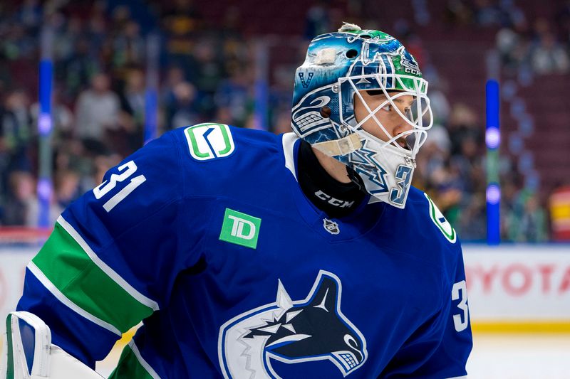 Oct 9, 2024; Vancouver, British Columbia, CAN; Vancouver Canucks goalie Arturs Silovs (31) skates during warm up prior to a game against the Calgary Flames at Rogers Arena. Mandatory Credit: Bob Frid-Imagn Images