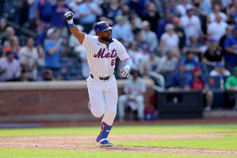 Apr 23, 2025; New York City, New York, USA; New York Mets designated hitter Starling Marte (6) celebrates his walkoff single against the Philadelphia Phillies during the tenth inning at Citi Field. Mandatory Credit: Brad Penner-Imagn Images