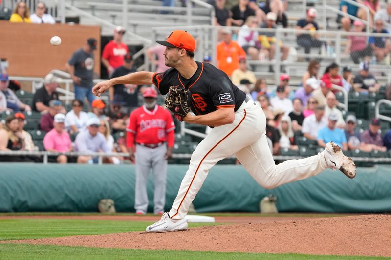 Feb 26, 2024; Scottsdale, Arizona, USA; San Francisco Giants pitcher Mason Black (82) throws against the Los Angeles Angels in the first inning at Scottsdale Stadium. Mandatory Credit: Rick Scuteri-USA TODAY Sports