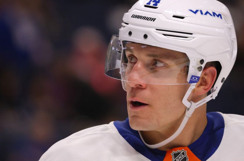 Nov 1, 2024; Buffalo, New York, USA;  New York Islanders center Bo Horvat (14) during a stoppage in play against the Buffalo Sabres during the second period at KeyBank Center. Mandatory Credit: Timothy T. Ludwig-Imagn Images