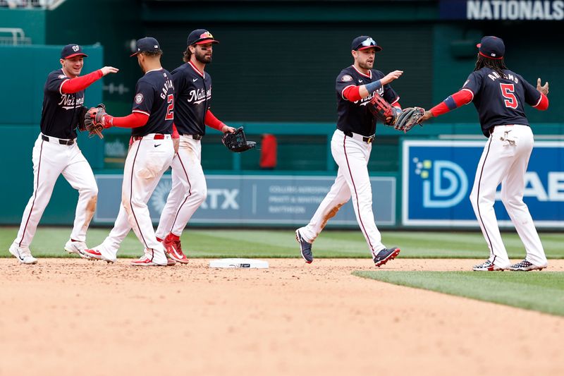 Apr 21, 2024; Washington, District of Columbia, USA; Washington Nationals players celebrate after their game against the Houston Astros at Nationals Park. Mandatory Credit: Geoff Burke-USA TODAY Sports