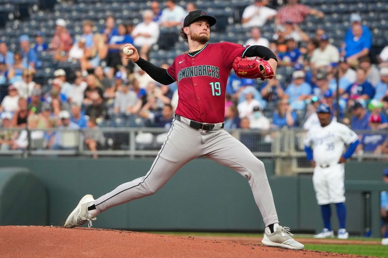 Jul 24, 2024; Kansas City, Missouri, USA; Arizona Diamondbacks starting pitcher Ryne Nelson (19) delivers a pitch against the Kansas City Royals in the first inning at Kauffman Stadium. Mandatory Credit: Denny Medley-USA TODAY Sports