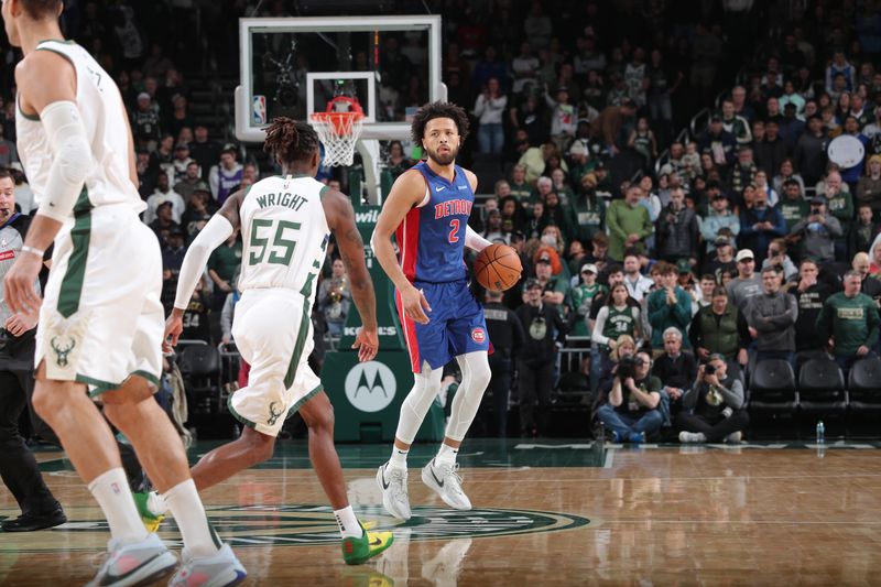 MILWAUKEE, WI - NOVEMBER 13: Cade Cunningham #2 of the Detroit Pistons looks to pass the ball during the game against the Milwaukee Bucks on November 13, 2024 at the Fiserv Forum Center in Milwaukee, Wisconsin. NOTE TO USER: User expressly acknowledges and agrees that, by downloading and or using this Photograph, user is consenting to the terms and conditions of the Getty Images License Agreement. Mandatory Copyright Notice: Copyright 2024 NBAE (Photo by Gary Dineen/NBAE via Getty Images).