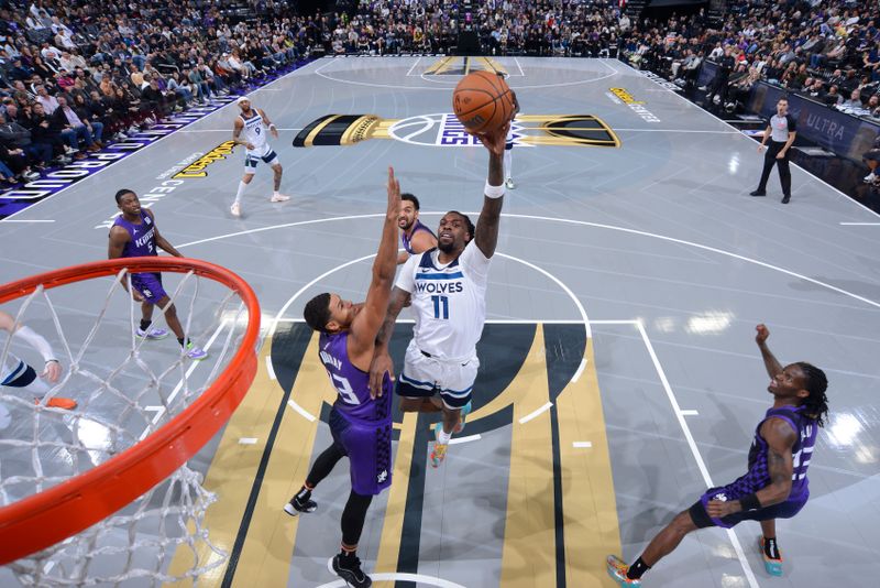 SACRAMENTO, CA - NOVEMBER 15: Naz Reid #11 of the Minnesota Timberwolves drives to the basket during the game against the Sacramento Kings during the Emirates NBA Cup game on November 15, 2024 at Golden 1 Center in Sacramento, California. NOTE TO USER: User expressly acknowledges and agrees that, by downloading and or using this Photograph, user is consenting to the terms and conditions of the Getty Images License Agreement. Mandatory Copyright Notice: Copyright 2024 NBAE (Photo by Rocky Widner/NBAE via Getty Images)