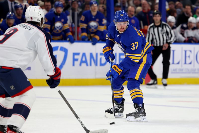 Dec 30, 2023; Buffalo, New York, USA;  Buffalo Sabres center Casey Mittelstadt (37) makes a pass during the second period against the Columbus Blue Jackets at KeyBank Center. Mandatory Credit: Timothy T. Ludwig-USA TODAY Sports