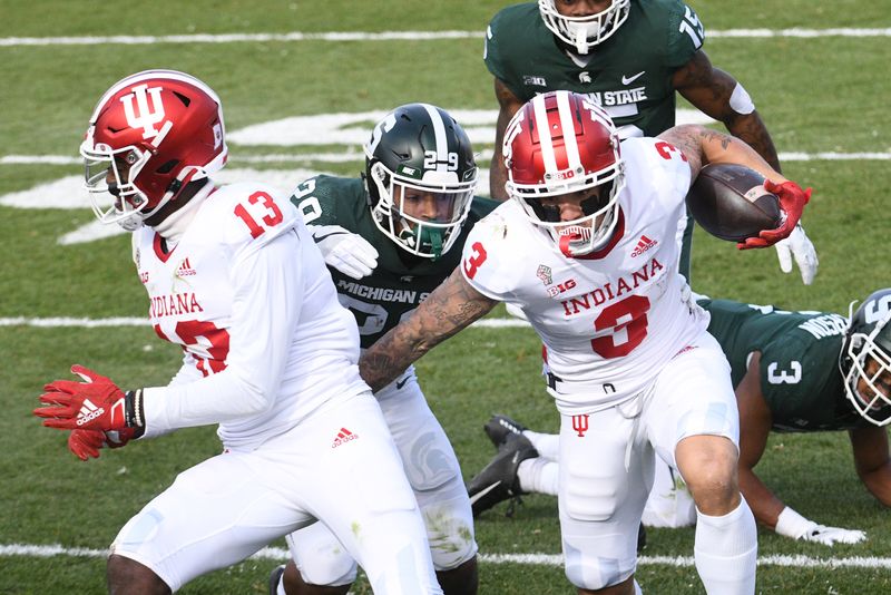 Nov 14, 2020; East Lansing, Michigan, USA; Indiana Hoosiers wide receiver Ty Fryfogle (3) runs for a touchdown during the first quarter against the Michigan State Spartans at Spartan Stadium. Mandatory Credit: Tim Fuller-USA TODAY Sports