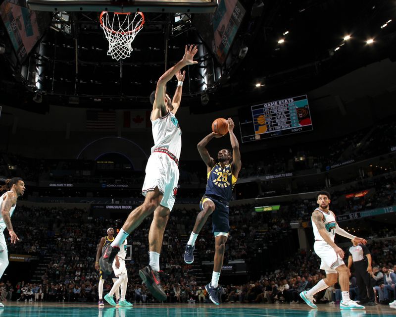 MEMPHIS, TN - DECEMBER 1: Quenton Jackson #29 of the Indiana Pacers shoots the ball during the game against the Memphis Grizzlies on December 1, 2024 at FedExForum in Memphis, Tennessee. NOTE TO USER: User expressly acknowledges and agrees that, by downloading and or using this photograph, User is consenting to the terms and conditions of the Getty Images License Agreement. Mandatory Copyright Notice: Copyright 2024 NBAE (Photo by Joe Murphy/NBAE via Getty Images)