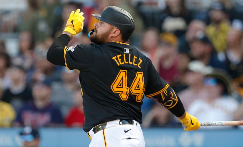 Jun 8, 2024; Pittsburgh, Pennsylvania, USA;  Pittsburgh Pirates first baseman Rowdy Tellez (44) hits a solo home run against the Minnesota Twins during the seventh inning at PNC Park. Pittsburgh won 4-0. Mandatory Credit: Charles LeClaire-USA TODAY Sports