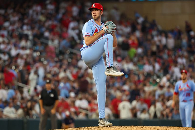 Aug 24, 2024; Minneapolis, Minnesota, USA; St. Louis Cardinals pitcher Matthew Liberatore (52) delivers a pitch against the Minnesota Twins during the seventh inning at Target Field. Mandatory Credit: Matt Krohn-USA TODAY Sports