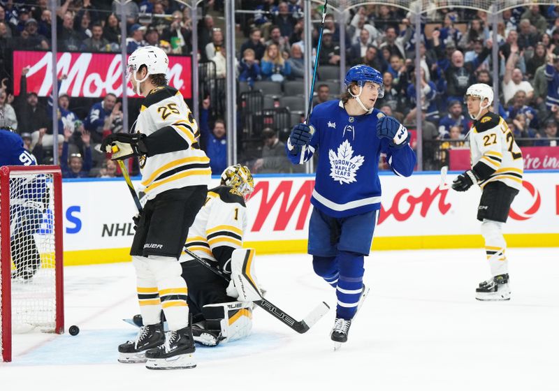 Nov 5, 2024; Toronto, Ontario, CAN; Toronto Maple Leafs left wing Matthew Knies (23) scores a goal and celebrates against the Boston Bruins during the third period at Scotiabank Arena. Mandatory Credit: Nick Turchiaro-Imagn Imagess