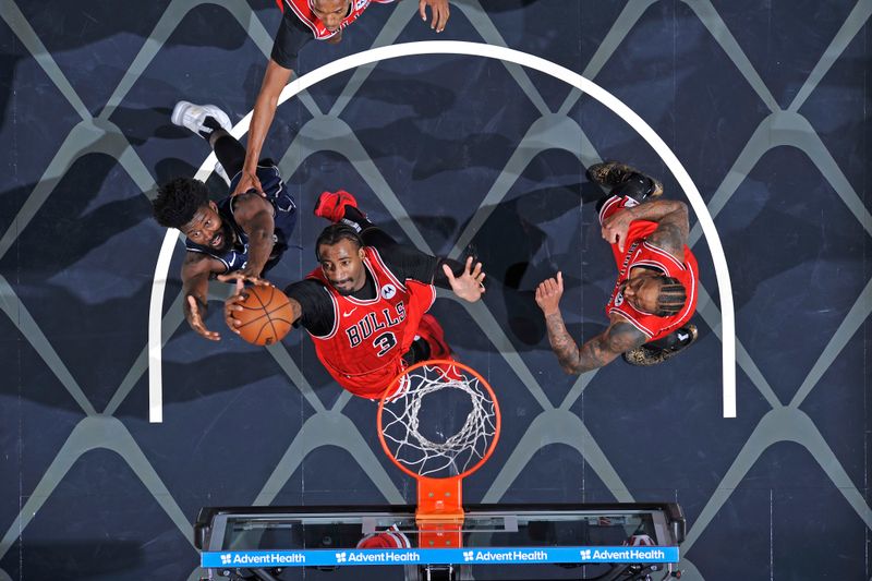 ORLANDO, FL - FEBRUARY 10: Andre Drummond #3 of the Chicago Bulls grabs a rebound during the game against the Orlando Magic on February 10, 2024 at the Kia Center in Orlando, Florida. NOTE TO USER: User expressly acknowledges and agrees that, by downloading and or using this photograph, User is consenting to the terms and conditions of the Getty Images License Agreement. Mandatory Copyright Notice: Copyright 2024 NBAE (Photo by Fernando Medina/NBAE via Getty Images)