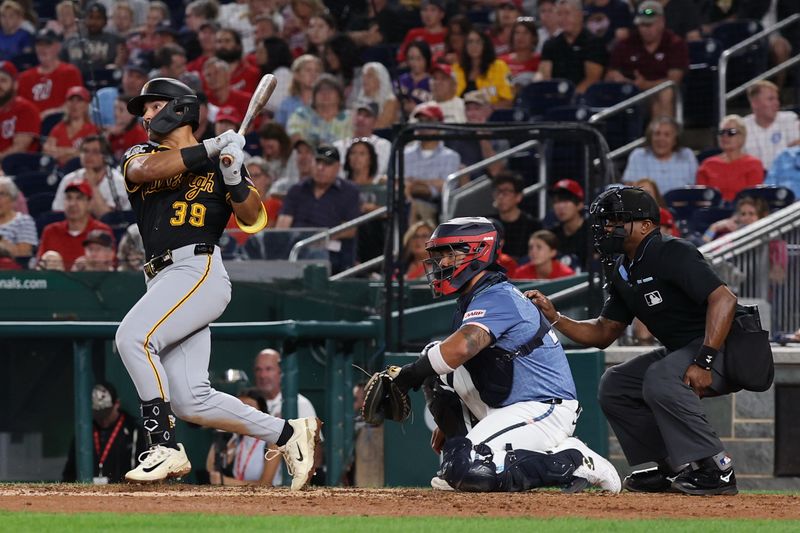 Sep 12, 2025; Washington, District of Columbia, USA; Pittsburgh Pirates second base Nick Gonzales (39) hits a ground rule double against the Washington Nationals during the ninth inning at Nationals Park. Mandatory Credit: Geoff Burke-Imagn Images