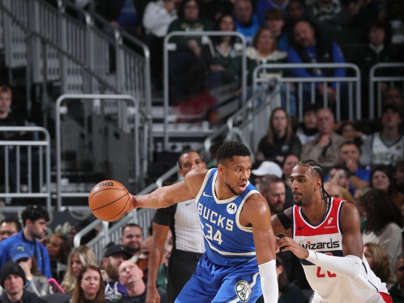 MILWAUKEE, WI - NOVEMBER 30: Giannis Antetokounmpo #34 of the Milwaukee Bucks handles the ball during the game against the Washington Wizards on November 30, 2024 at Fiserv Forum Center in Milwaukee, Wisconsin. NOTE TO USER: User expressly acknowledges and agrees that, by downloading and or using this Photograph, user is consenting to the terms and conditions of the Getty Images License Agreement. Mandatory Copyright Notice: Copyright 2024 NBAE (Photo by Gary Dineen/NBAE via Getty Images).