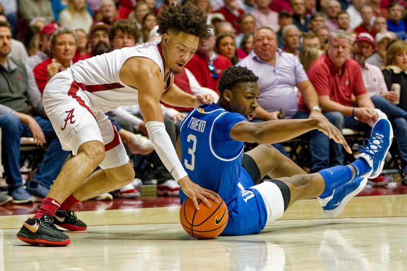 Jan 7, 2023; Tuscaloosa, Alabama, USA; Alabama Crimson Tide guard Mark Sears (1) goes for the ball along with Kentucky Wildcats guard Adou Thiero (3) during first half at Coleman Coliseum. Mandatory Credit: Marvin Gentry-USA TODAY Sports