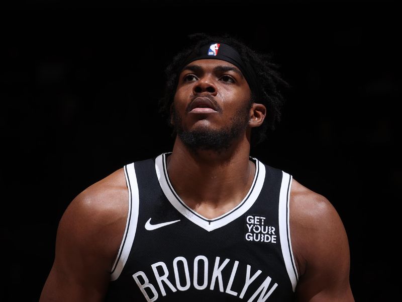 BROOKLYN, NY - DECEMBER 8: Day'Ron Sharpe #20 of the Brooklyn Nets shoots a free throw during the game against the Milwaukee Bucks on December 8, 2024 at Barclays Center in Brooklyn, New York. NOTE TO USER: User expressly acknowledges and agrees that, by downloading and or using this Photograph, user is consenting to the terms and conditions of the Getty Images License Agreement. Mandatory Copyright Notice: Copyright 2024 NBAE (Photo by Nathaniel S. Butler/NBAE via Getty Images)