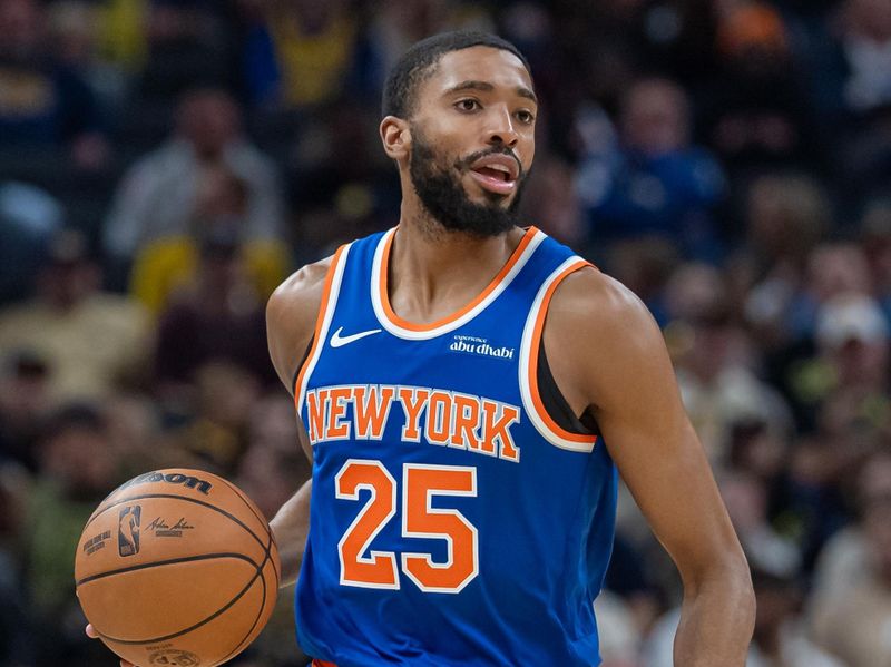 INDIANAPOLIS, INDIANA - NOVEMBER 10: Mikal Bridges #25 of the New York Knicks brings the ball up court during the game against the Indiana Pacers at Gainbridge Fieldhouse on November 10, 2024 in Indianapolis, Indiana. NOTE TO USER: User expressly acknowledges and agrees that, by downloading and or using this photograph, User is consenting to the terms and conditions of the Getty Images License Agreement. (Photo by Michael Hickey/Getty Images)