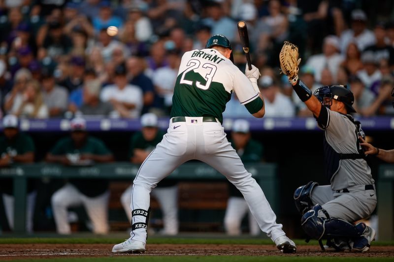 Jul 15, 2023; Denver, Colorado, USA; Colorado Rockies designated hitter Kris Bryant (23) leans away from a pitch in the sixth inning against the Colorado Rockies at Coors Field. Mandatory Credit: Isaiah J. Downing-USA TODAY Sports