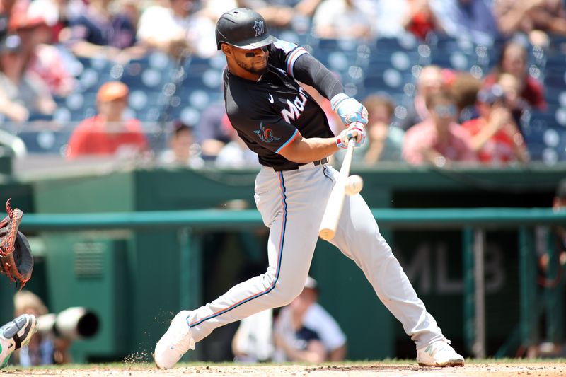 Jun 16, 2024; Washington, District of Columbia, USA; Miami Marlins second base Otto Lopez (61) flies out during the second inning in a game against the Washington Nationals at Nationals Park. Mandatory Credit: Daniel Kucin Jr.-USA TODAY Sports