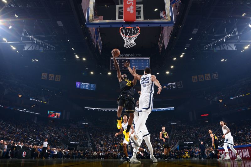 SAN FRANCISCO, CA - NOVEMBER 15: Andrew Wiggins #22 of the Golden State Warriors drives to the basket during the game against the Memphis Grizzlies during the Emirates NBA Cup game on November 15, 2024 at Chase Center in San Francisco, California. NOTE TO USER: User expressly acknowledges and agrees that, by downloading and or using this photograph, user is consenting to the terms and conditions of Getty Images License Agreement. Mandatory Copyright Notice: Copyright 2024 NBAE (Photo by Noah Graham/NBAE via Getty Images)