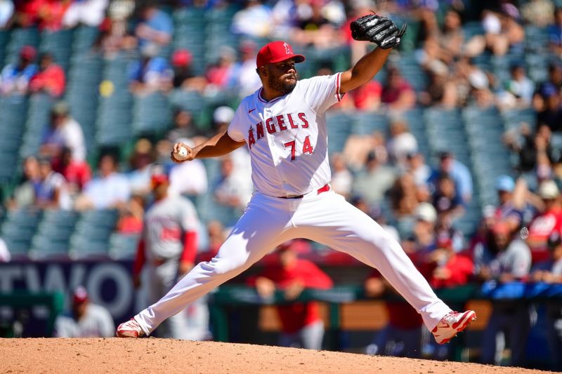 Jun 29, 2025; Anaheim, California, USA; Los Angeles Angels pitcher Kenley Jansen (74) throws against the Washington Nationals during the ninth inning  at Angel Stadium. Mandatory Credit: Gary A. Vasquez-Imagn Images
